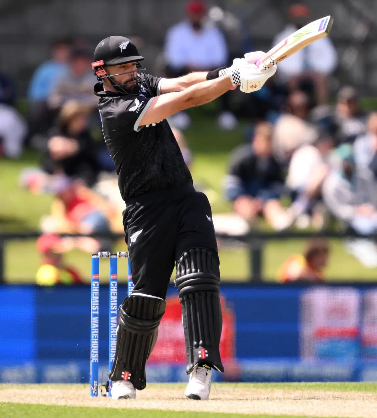 Mitchell’s Brilliant Ton Guides New Zealand to a Competitive 269 on a Challenging Pitch